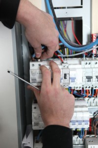 Man at a fuse box